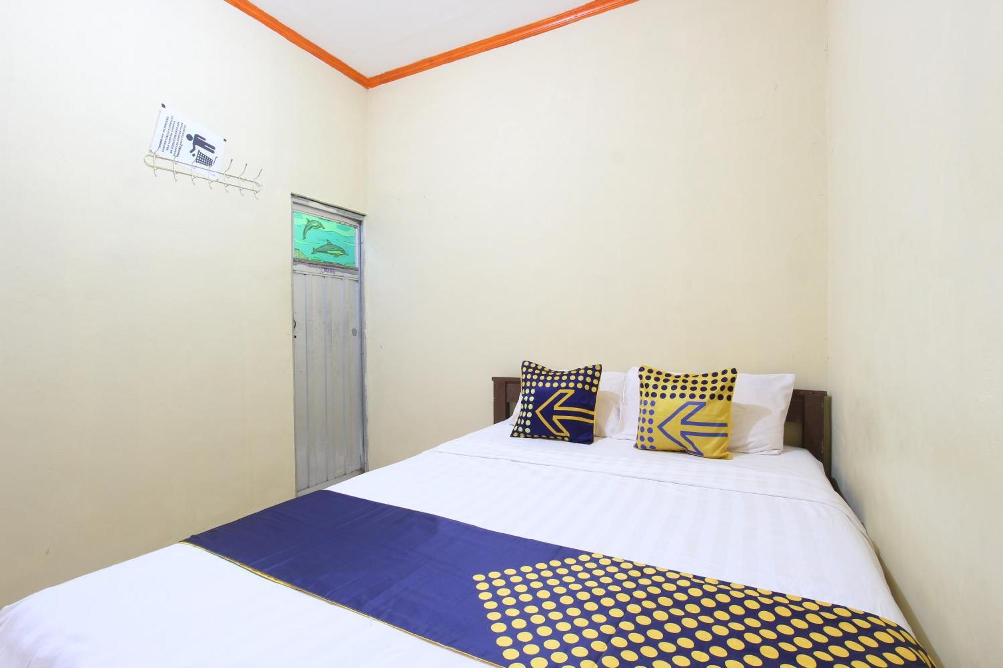 Oyo 92231 Penginapan Tanjung Alang Syariah Makassar Buitenkant foto